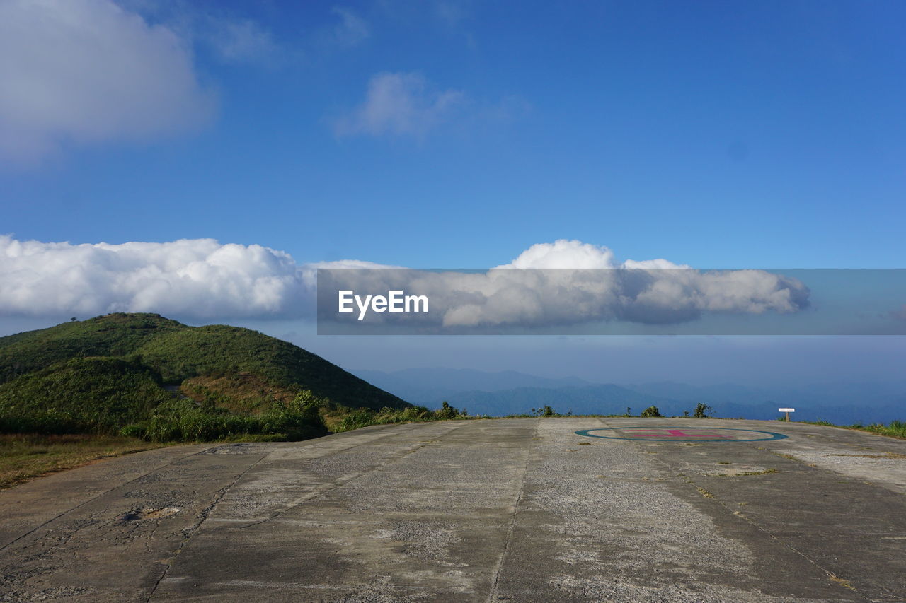 sky, cloud, sea, horizon, transportation, coast, environment, nature, road, landscape, scenics - nature, travel, water, land, hill, beauty in nature, travel destinations, no people, blue, tourism, day, outdoors, beach, ocean, the way forward, tranquility, holiday, mode of transportation, trip, non-urban scene, vacation, shore, tranquil scene