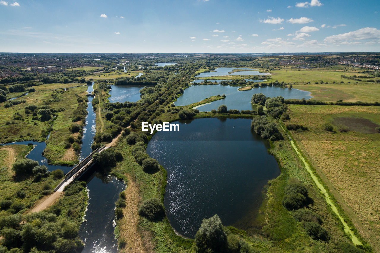 High angle view of country park against sky on sunny day