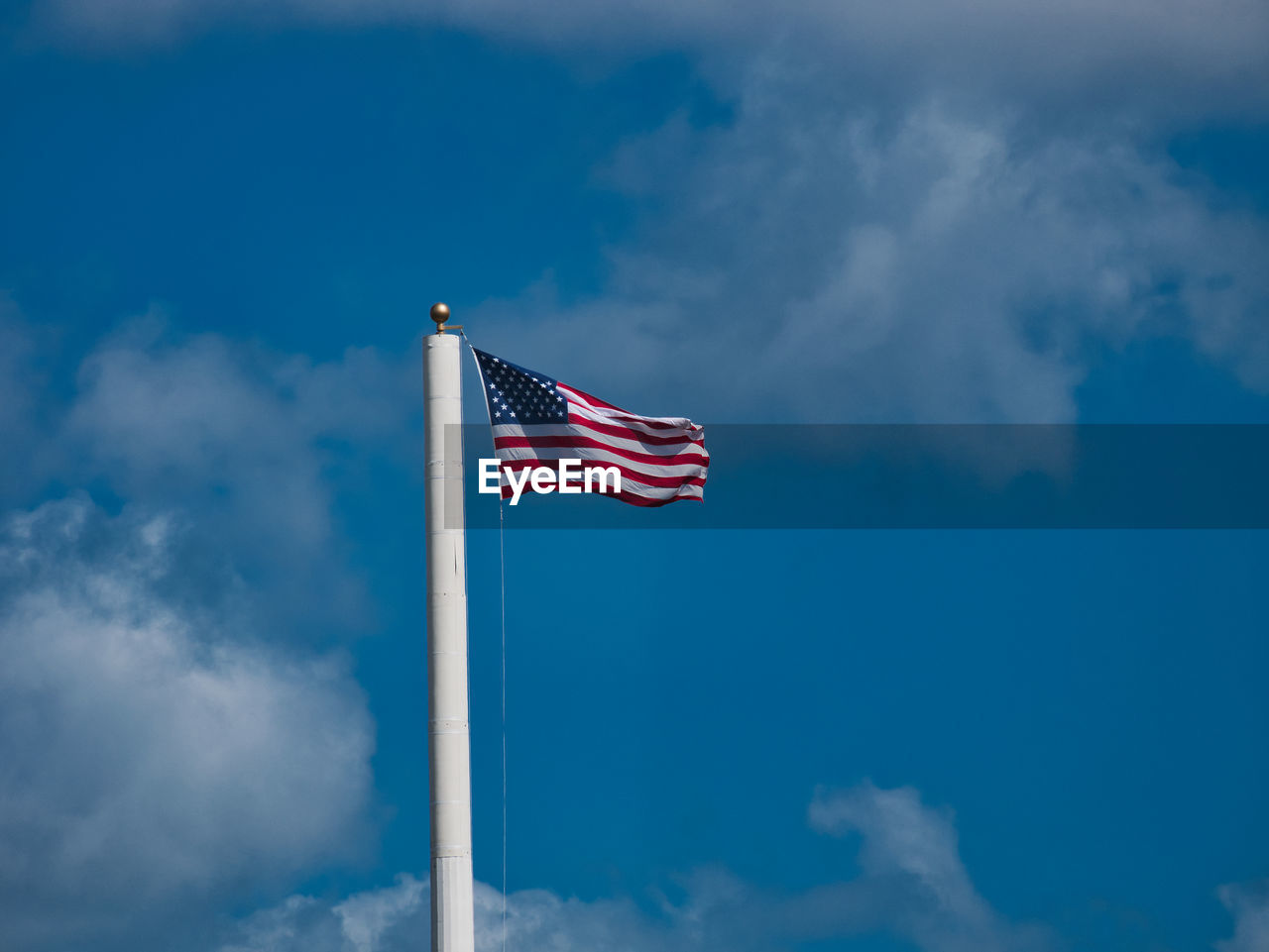 American flag flying in the wing