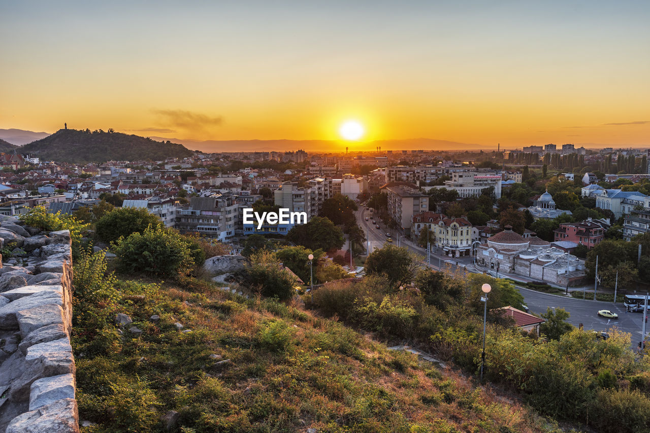 High angle view of townscape against sky during sunset