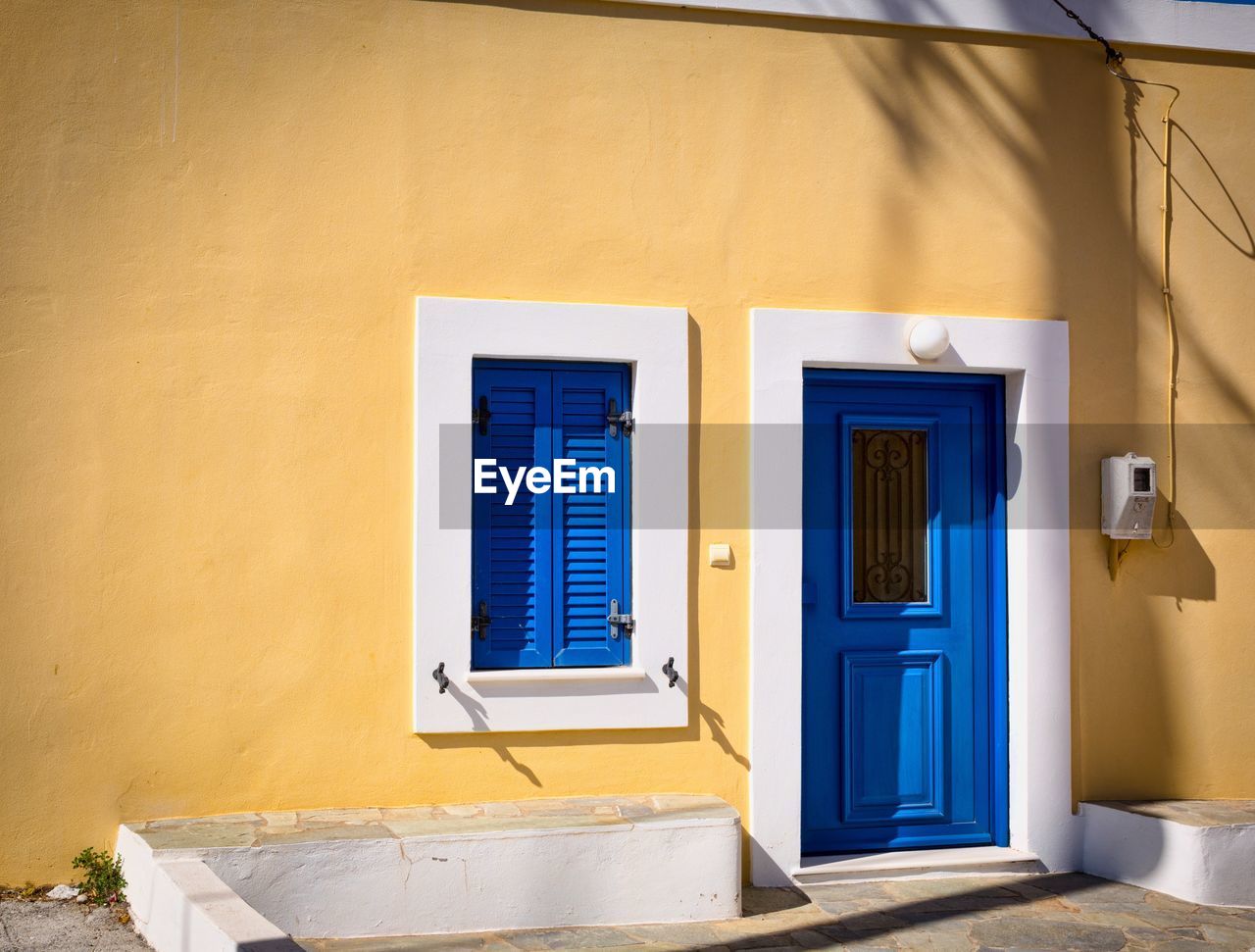 EXTERIOR OF YELLOW HOUSE