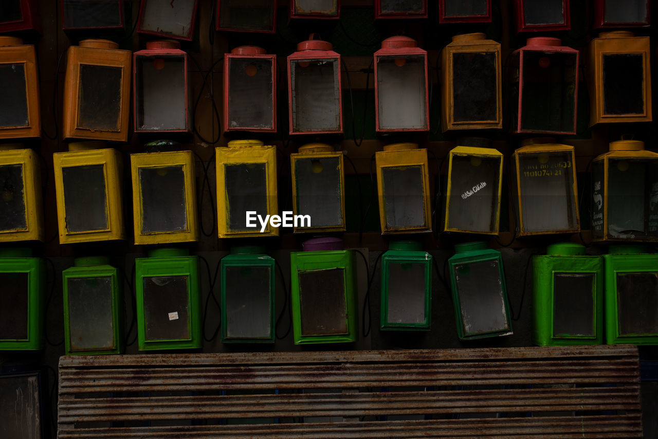 in a row, no people, green, full frame, backgrounds, side by side, large group of objects, repetition, arrangement, indoors, yellow, multi colored, architecture, order