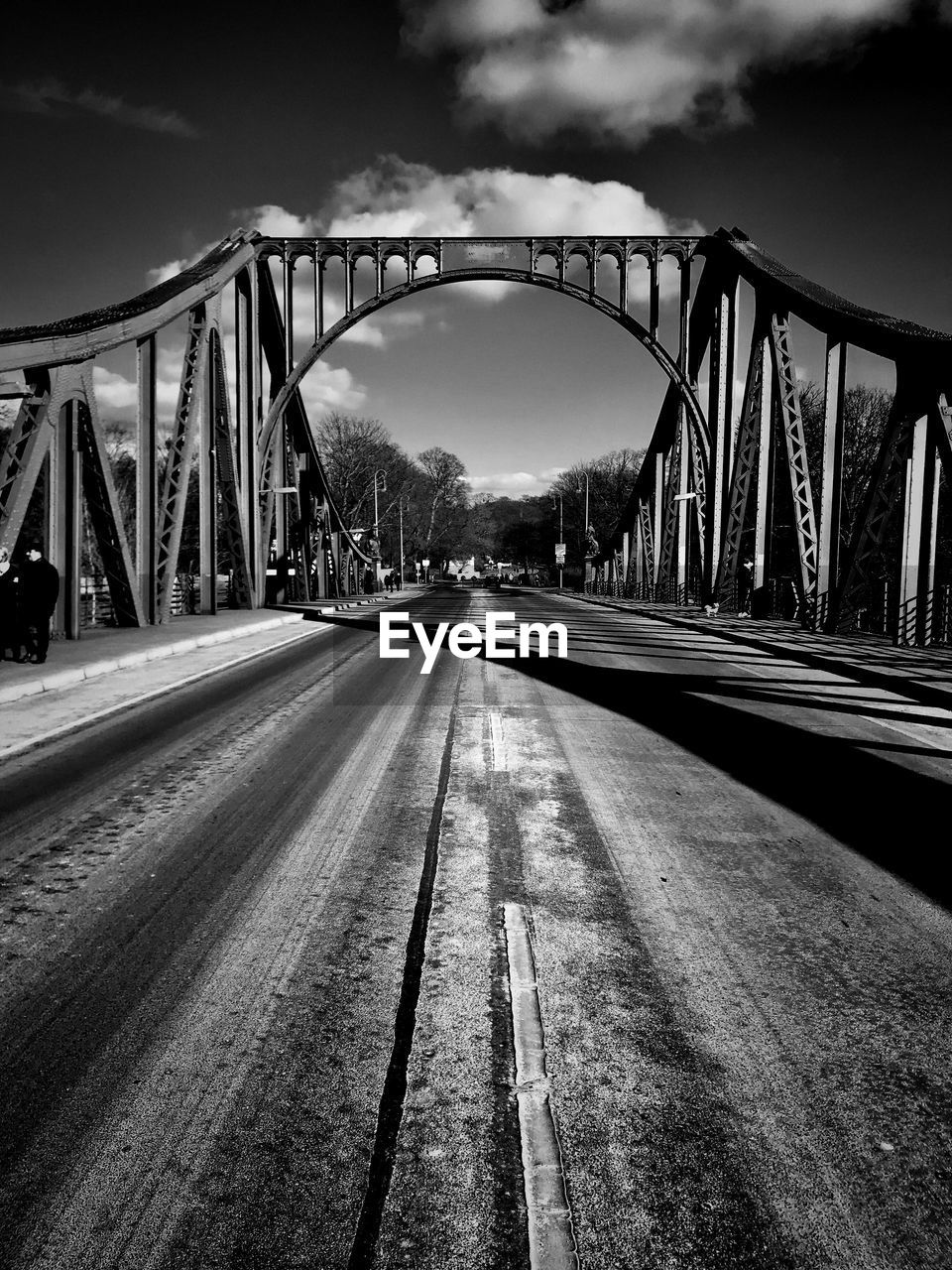 View of bridge against cloudy sky