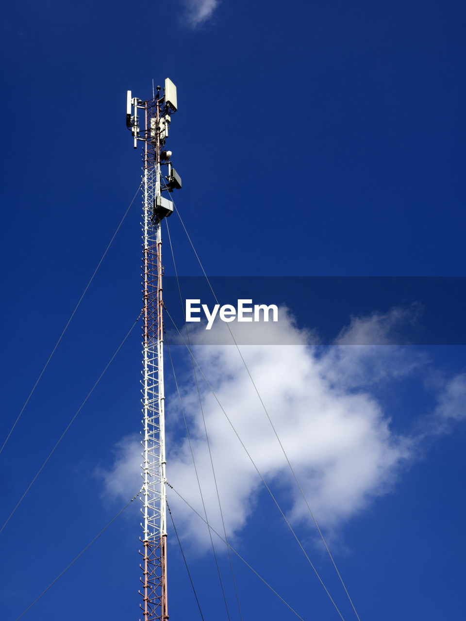 Gsm antenna of mobile communication on a blue sky background