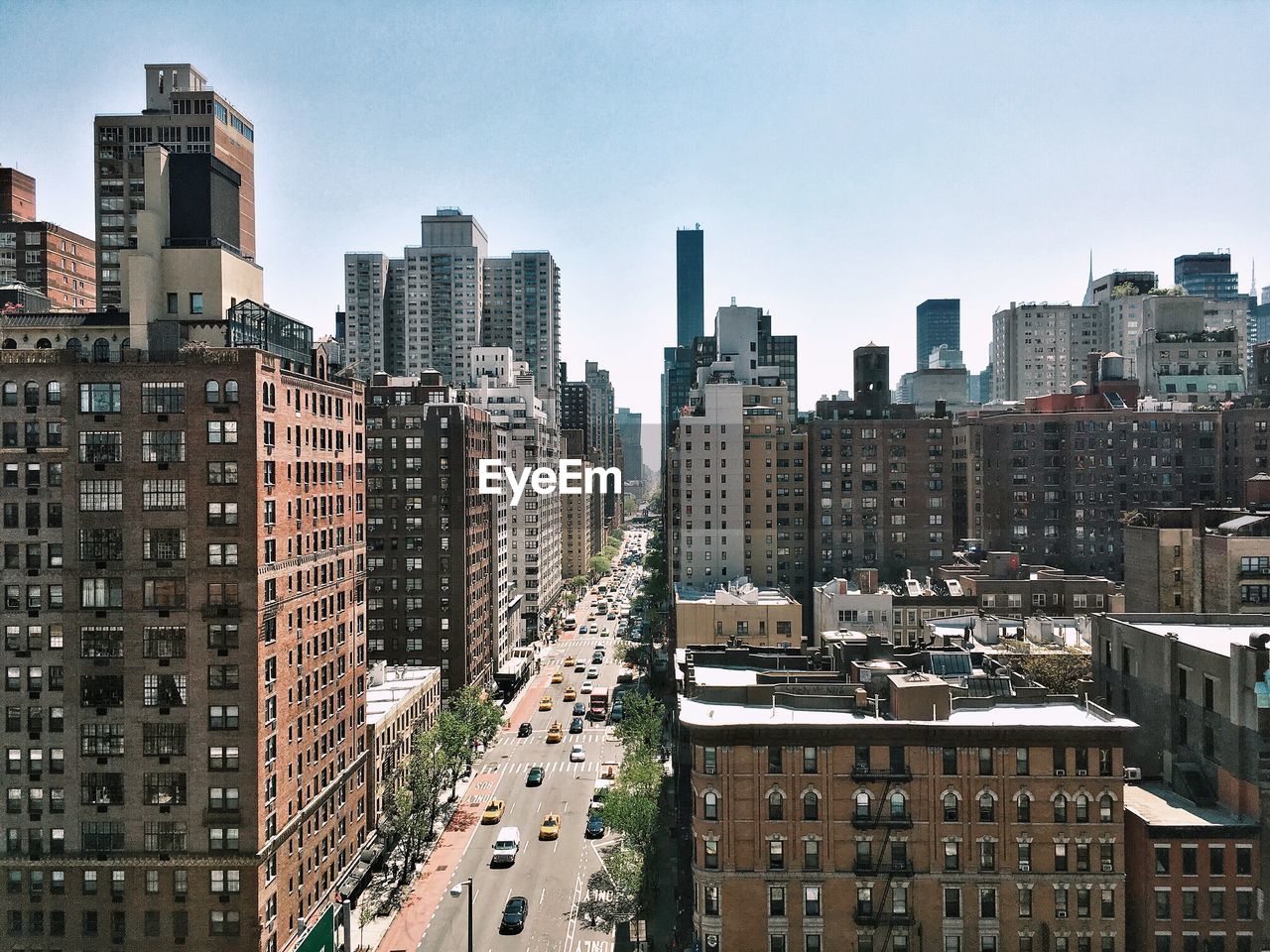 HIGH ANGLE VIEW OF MODERN BUILDINGS IN CITY