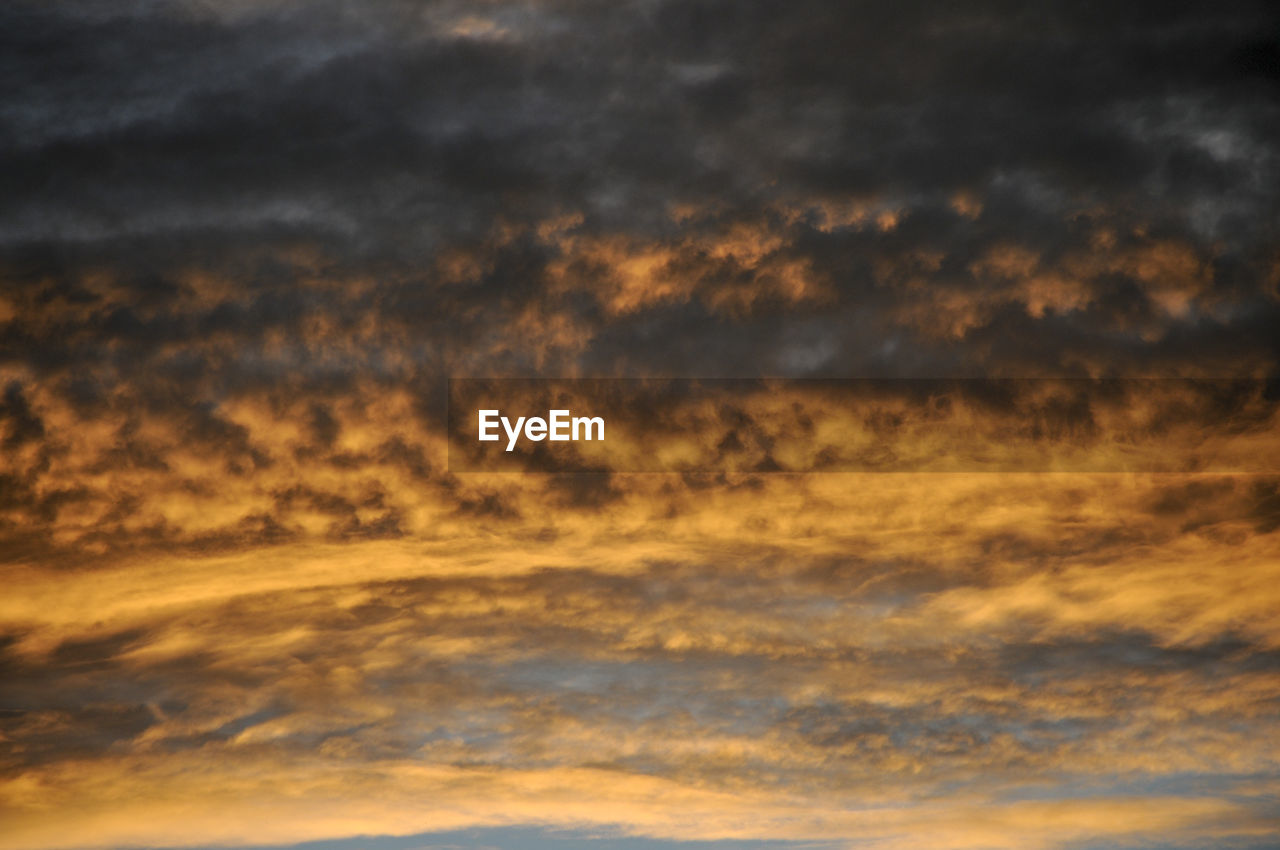 LOW ANGLE VIEW OF ORANGE CLOUDY SKY