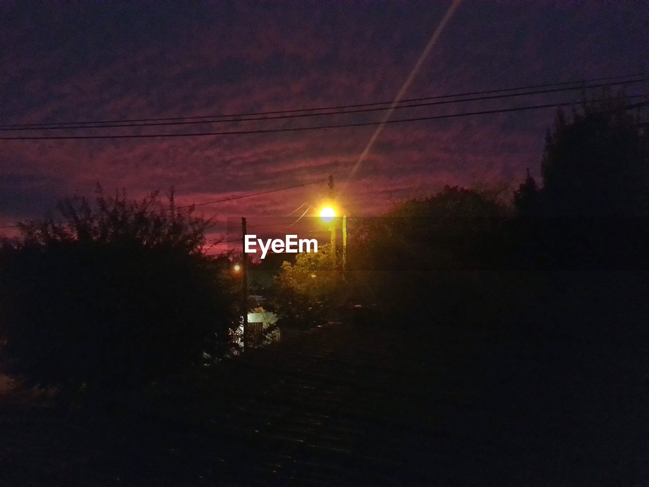 VIEW OF ROAD AT SUNSET