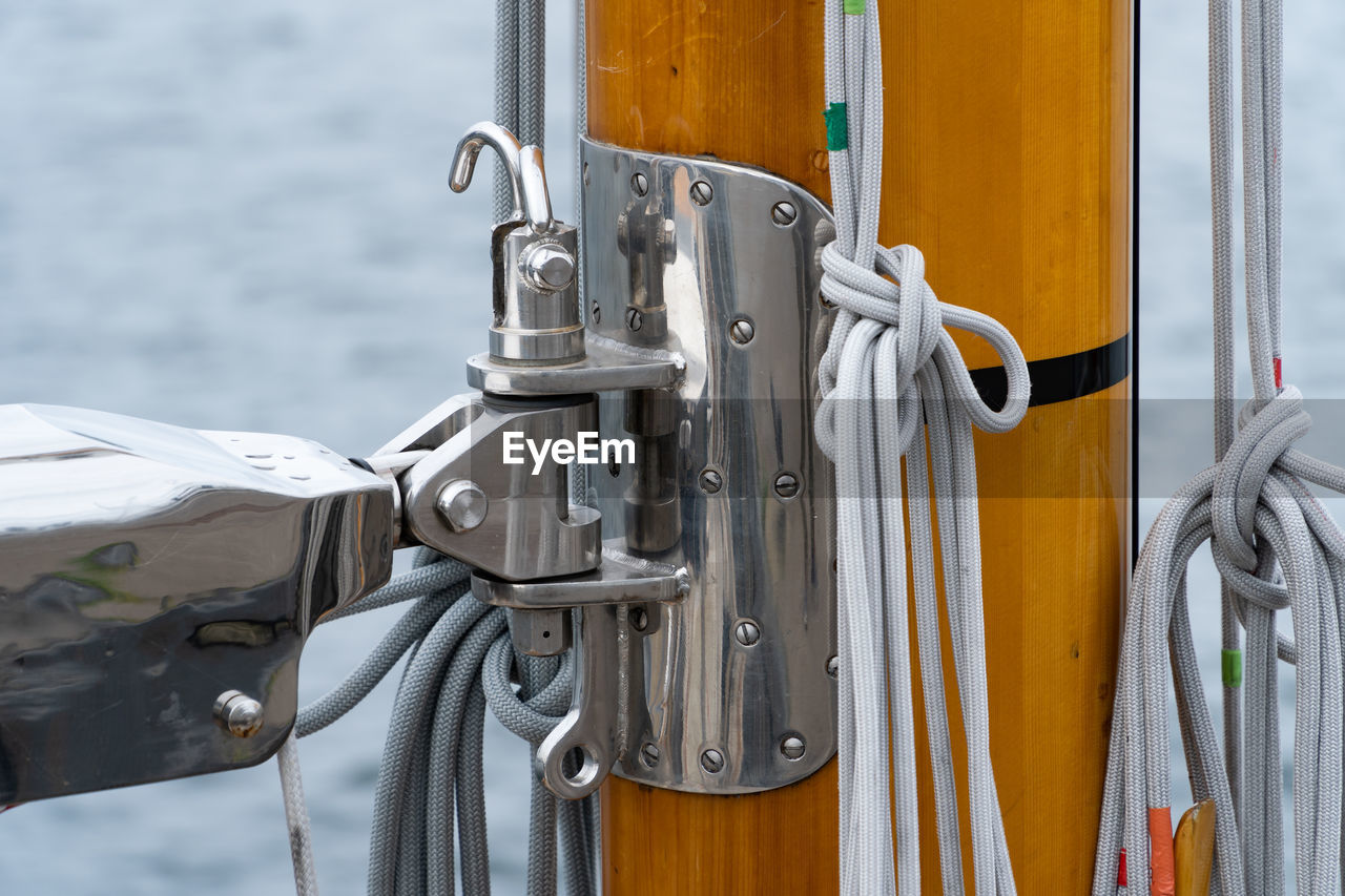 Close-up of ropes tied on boat