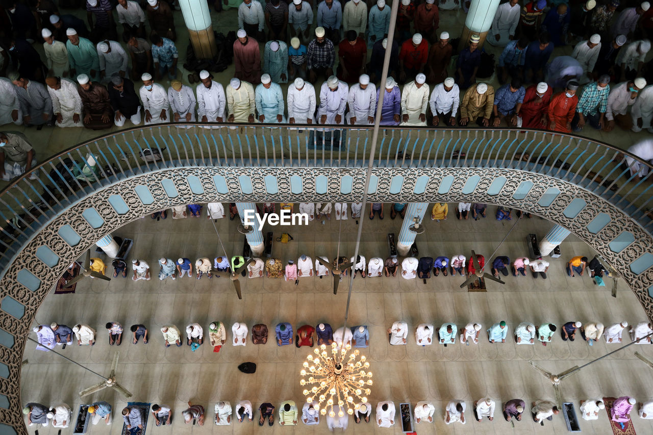 High angle view of group of people in mosque