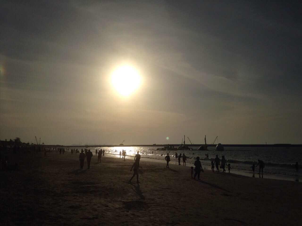 PEOPLE AT BEACH DURING SUNSET