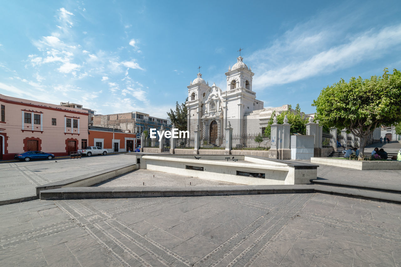 View of historic building against cloudy sky, arequipa, perù