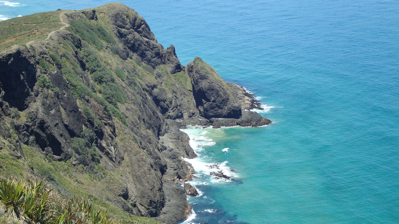 Scenic view of cliff and sea