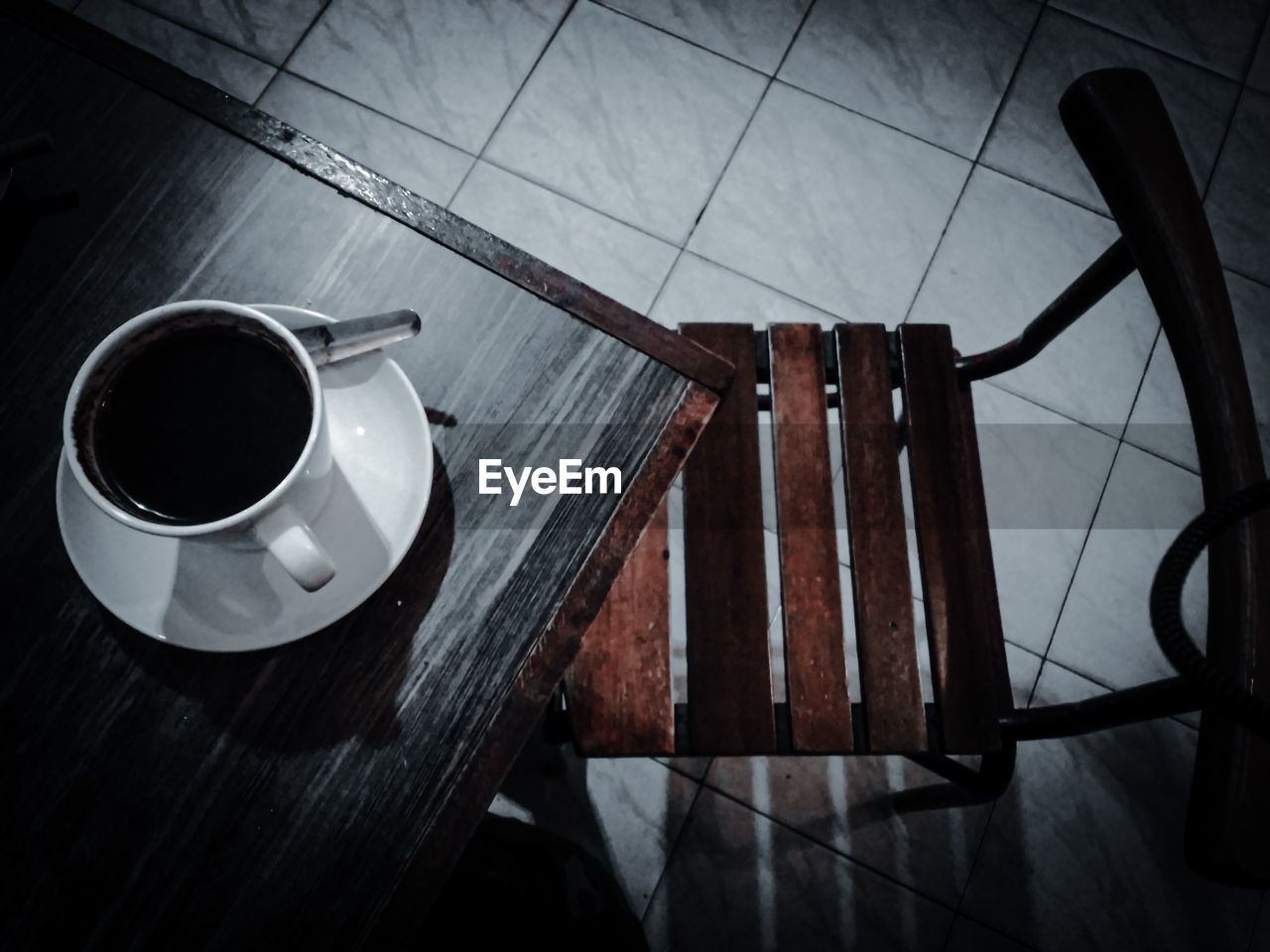 High angle view of coffee cup on table