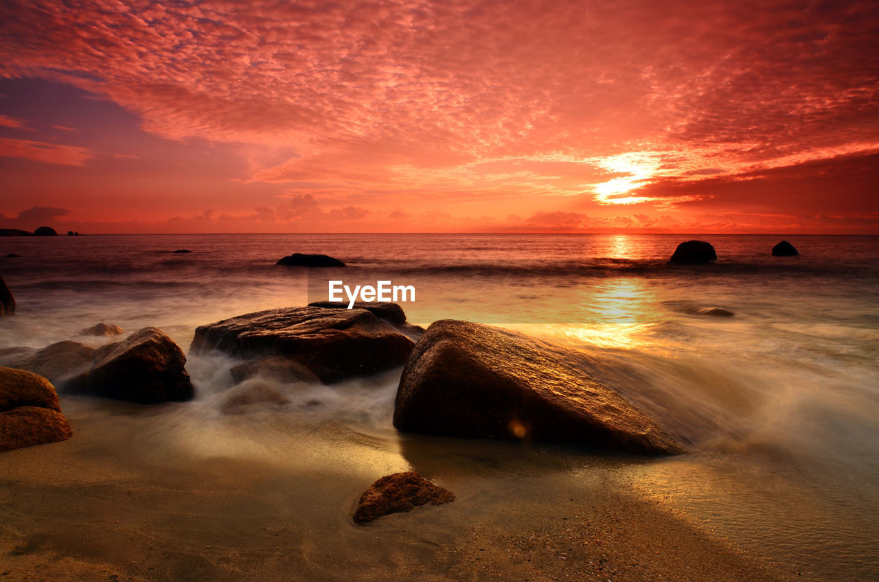 Scenic view of sea against sky during sunset