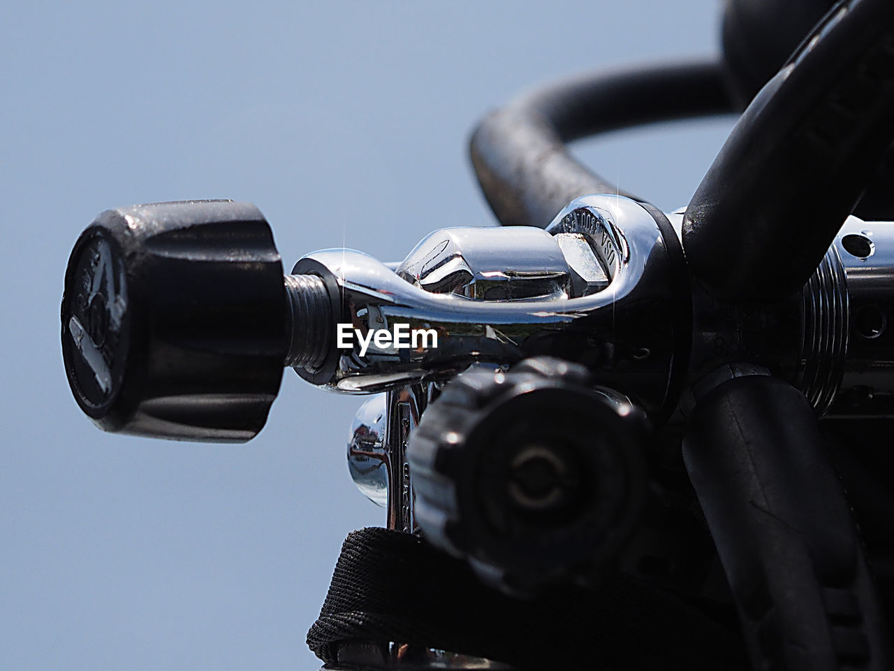 LOW ANGLE VIEW OF METAL AGAINST CLEAR SKY