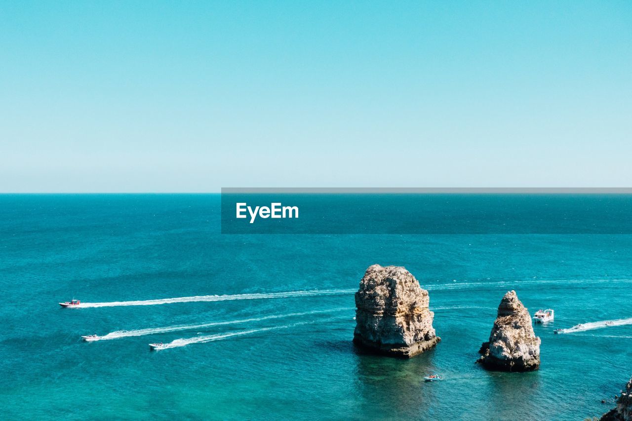 SCENIC VIEW OF BLUE SEA AGAINST SKY