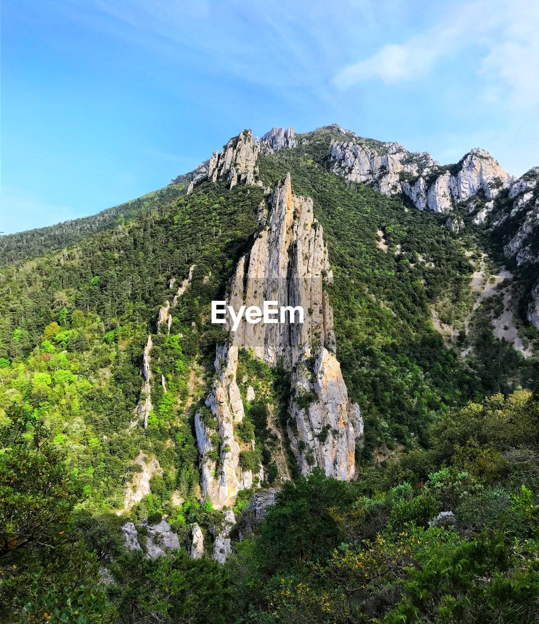 Scenic view of rocky mountains against sky