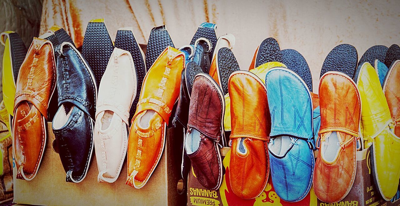 Colorful shoes at market for sale