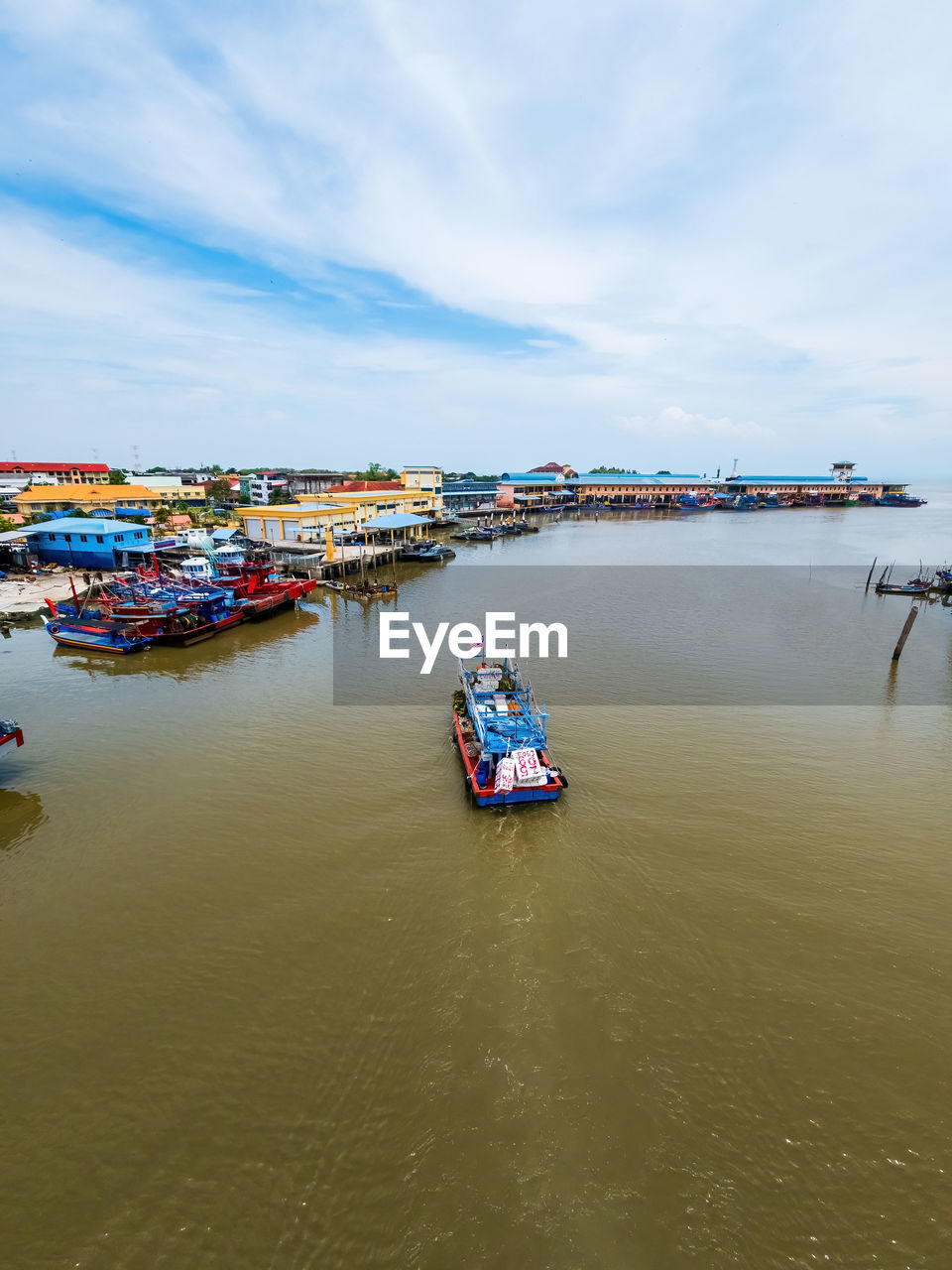 water, nautical vessel, transportation, mode of transportation, sea, sky, nature, vehicle, architecture, cloud, boat, body of water, day, outdoors, harbor, travel, ship, coast, travel destinations, no people, land, building exterior, built structure, moored, pier, beauty in nature, watercraft, waterfront, reflection, beach, scenics - nature, freight transportation, city, shore, high angle view, shipping