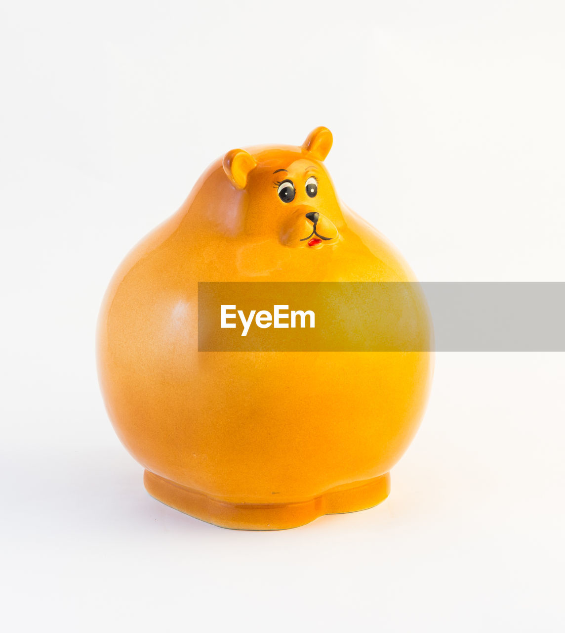 Studio shot of orange color piggy bank