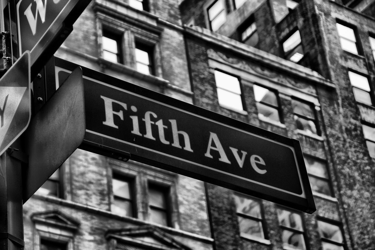 Low angle view of sign against building