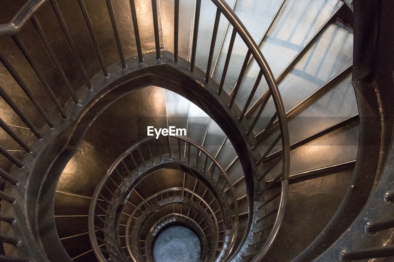 DIRECTLY ABOVE SHOT OF SPIRAL STAIRCASE OF BUILDING