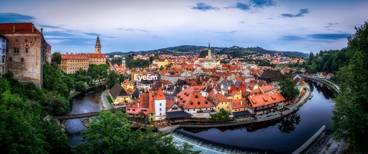 Cesky krumlov panoramic view taken right after the sunset. river vltava in czech republic.