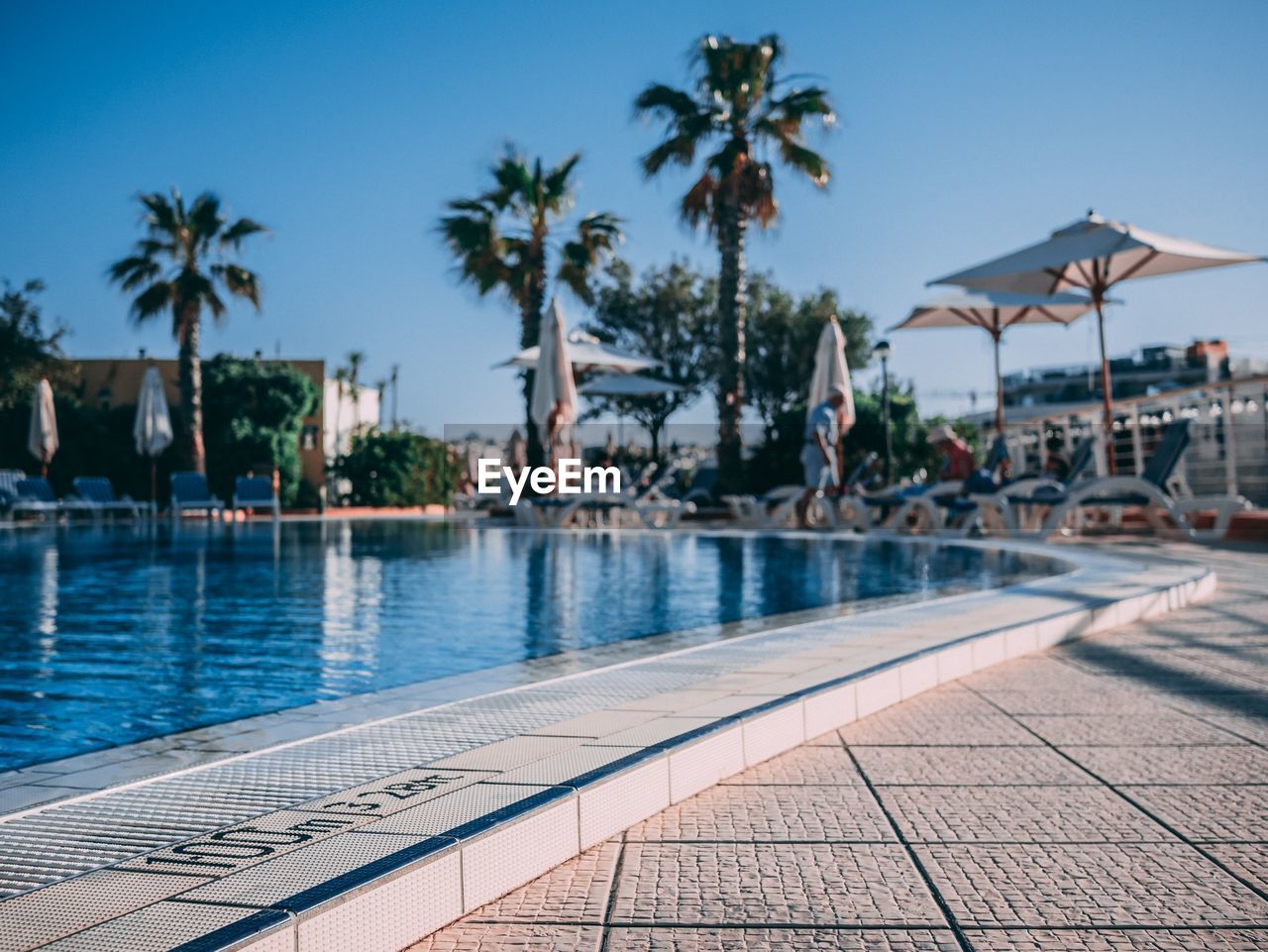 View of swimming pool at hotel