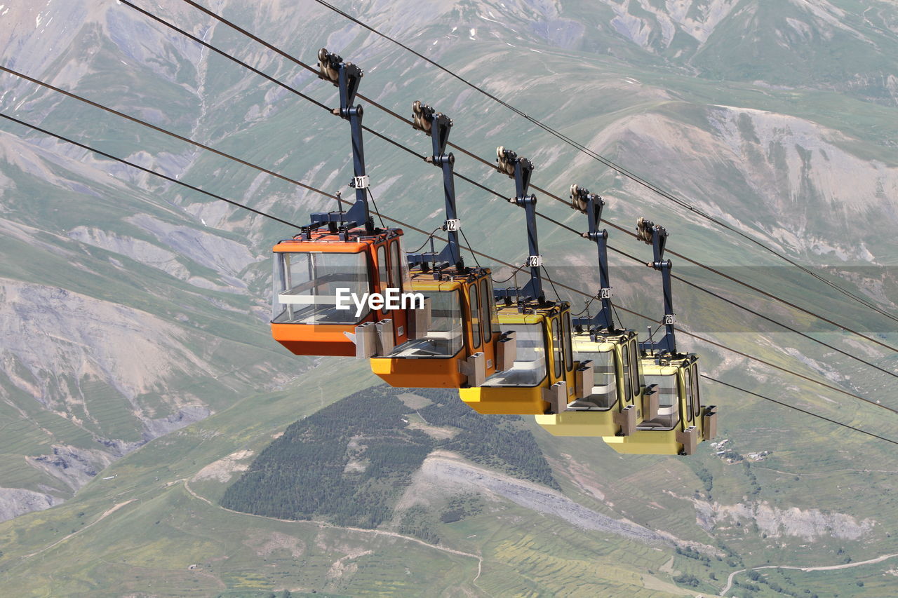 Overhead cable car over mountains