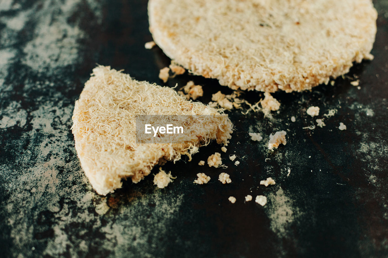 HIGH ANGLE VIEW OF COOKIES IN CONTAINER