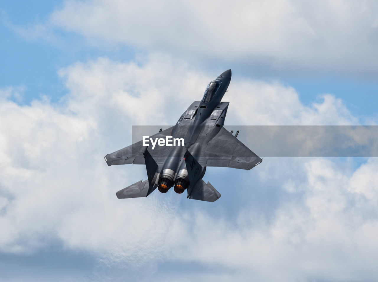 LOW ANGLE VIEW OF AIRPLANE AGAINST SKY