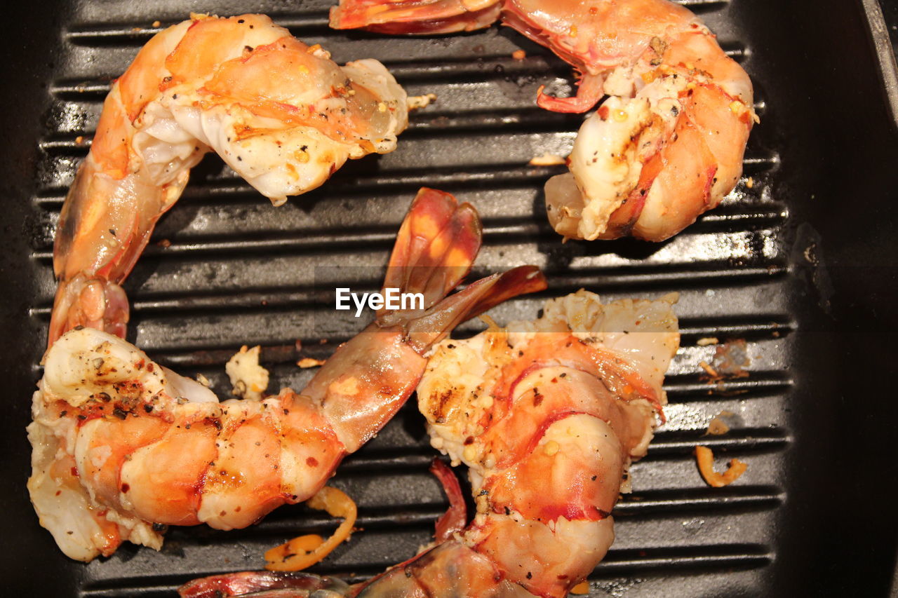Close-up of meat on barbecue grill