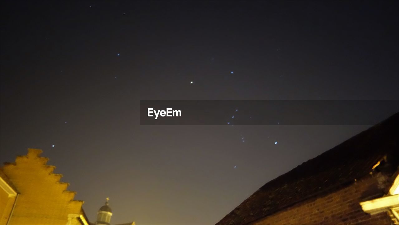 LOW ANGLE VIEW OF STAR FIELD AGAINST SKY AT NIGHT