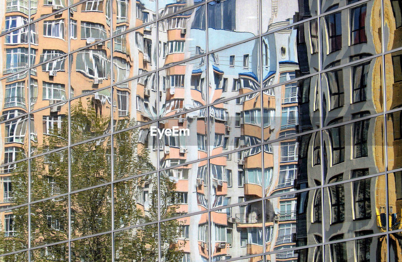 LOW ANGLE VIEW OF MODERN BUILDINGS