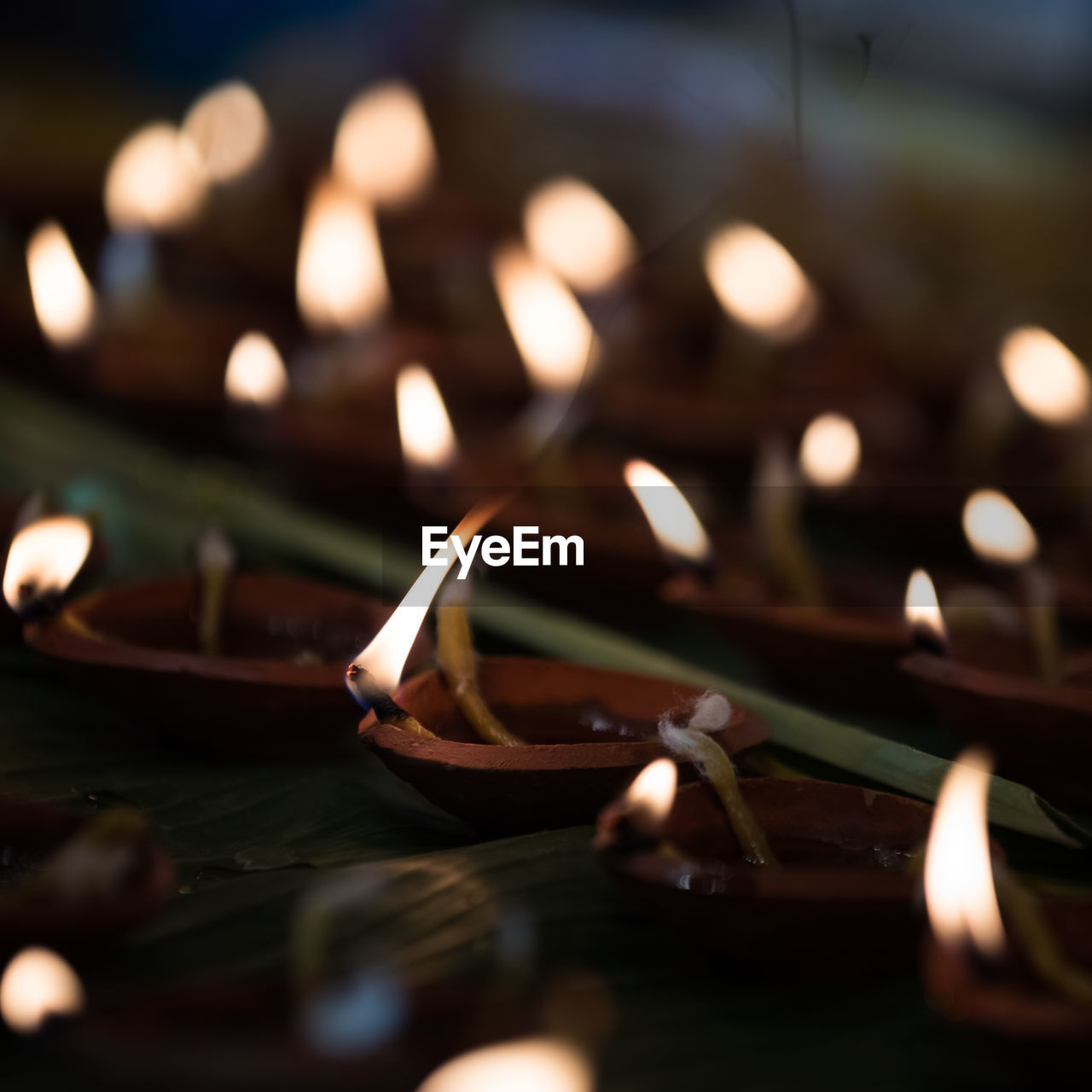 Close-up of lit candles