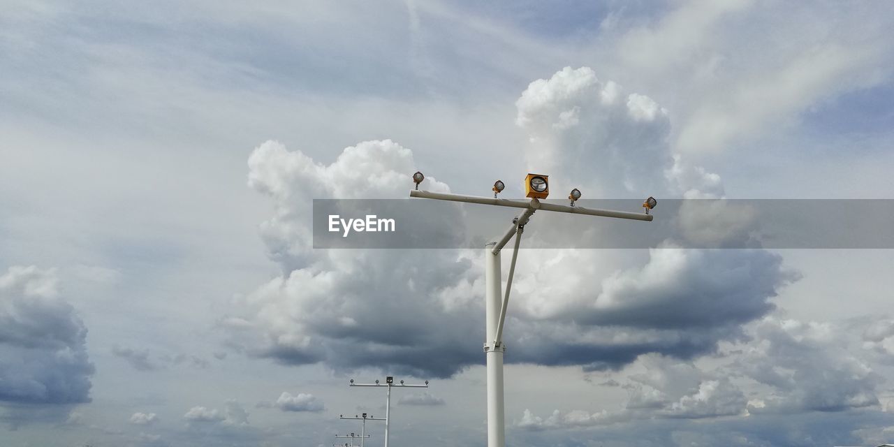 Low angle view of street light against sky