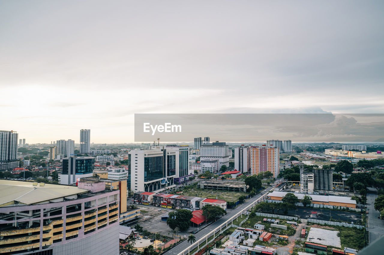 Panoramic view of city skyline, traffic and buildings.