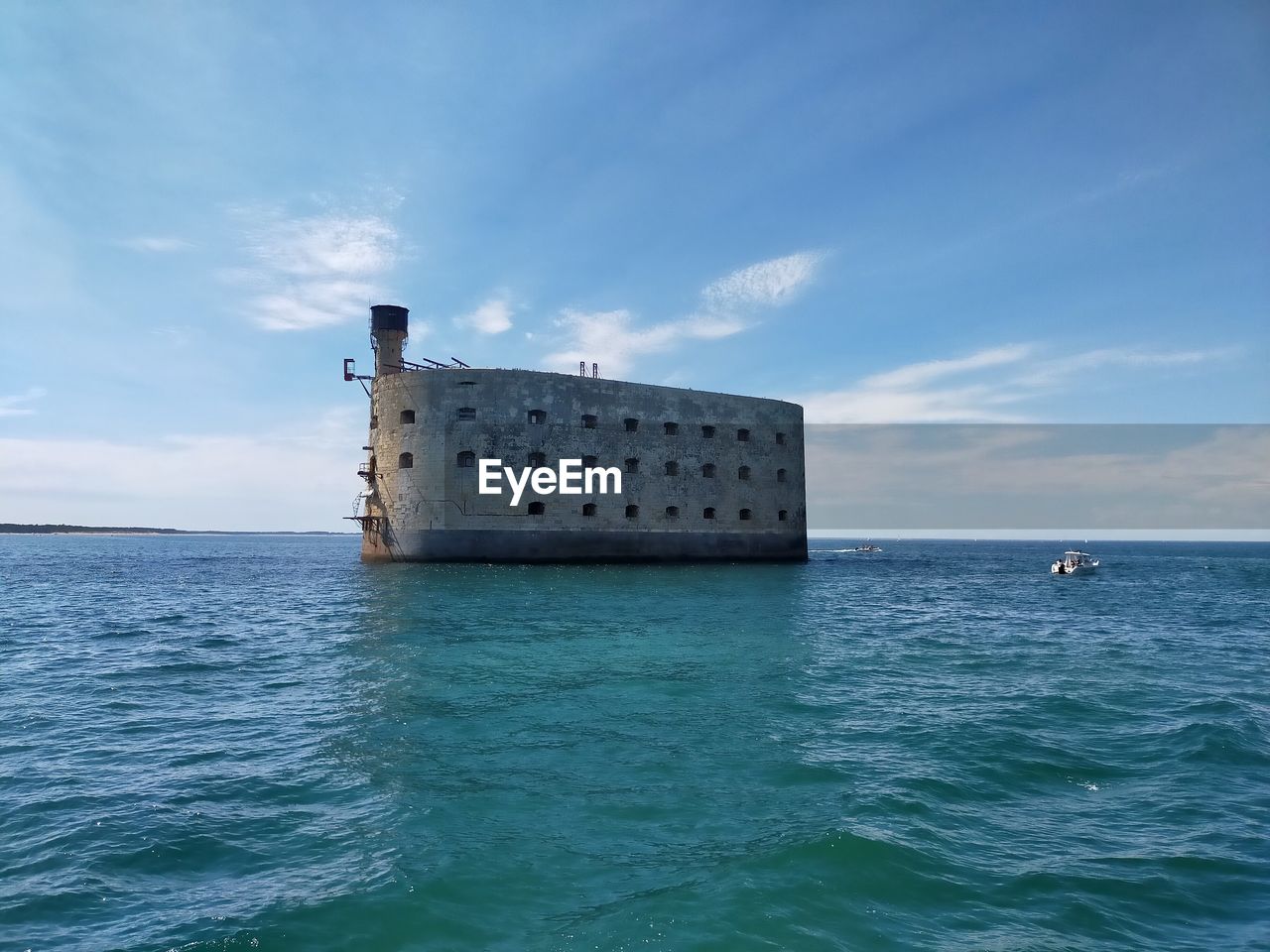 Scenic view of sea with fort boyard against sky