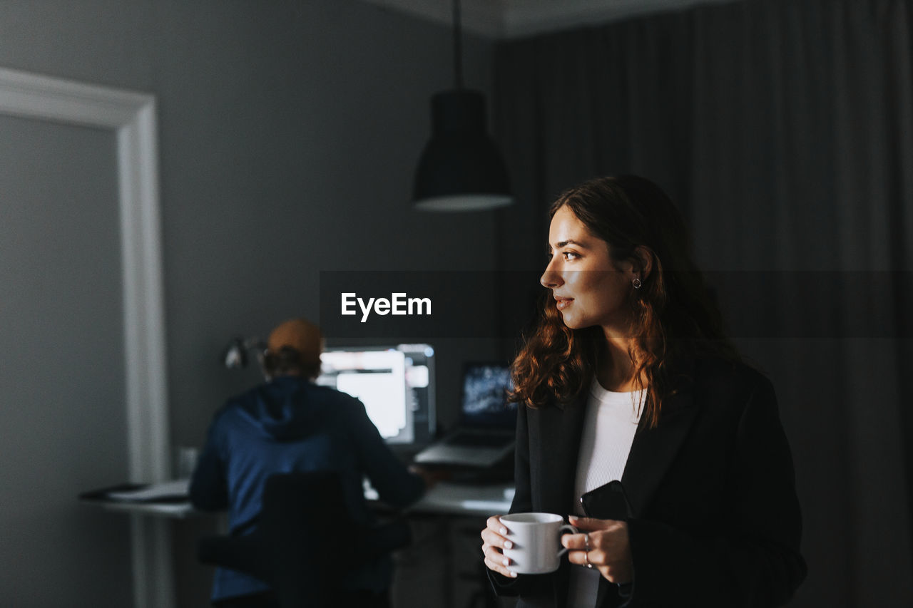 Smiling woman in office