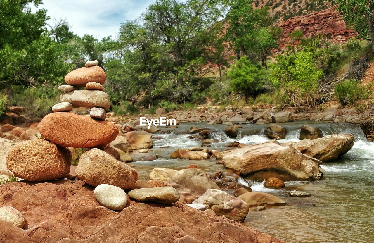 Stack of stones by river