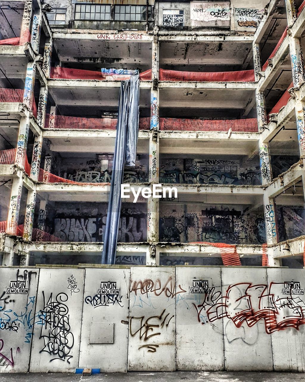 HIGH ANGLE VIEW OF GRAFFITI ON STAIRCASE OF BUILDING