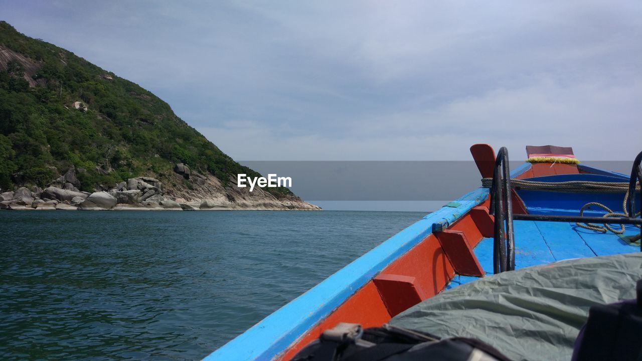 VIEW OF BOATS IN SEA