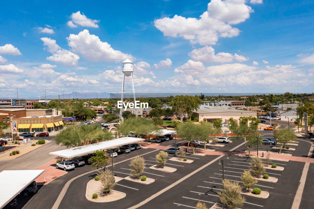 July 28, 2022, gilbert, arizona, usa. suburb of phoenix. drone rises over parking lot.