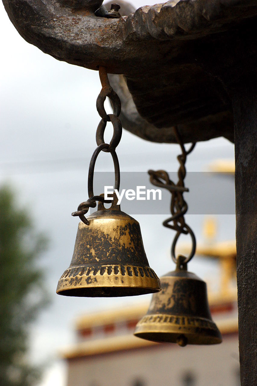 Close-up of old bells at temple