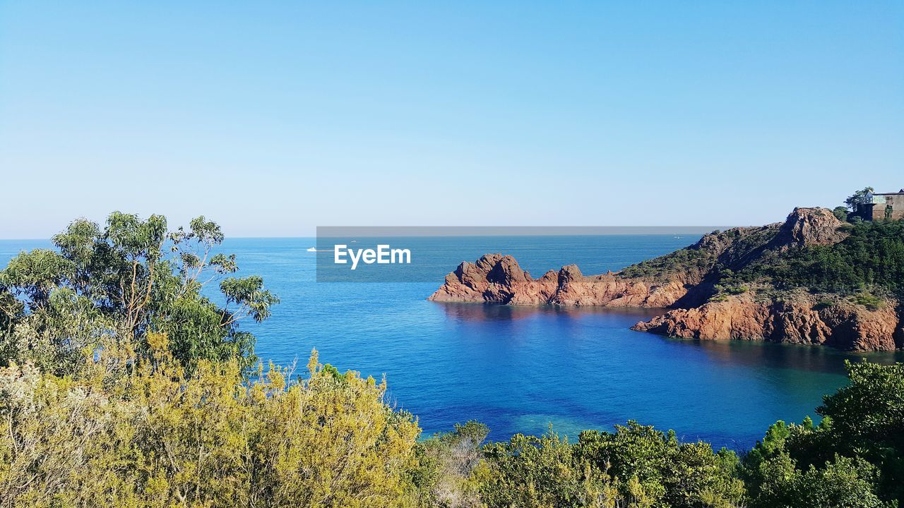 Scenic view of sea against clear sky