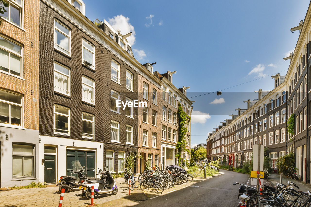 buildings in city against sky