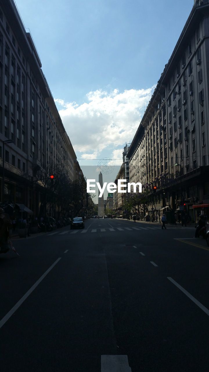 VIEW OF CITY STREET AGAINST SKY