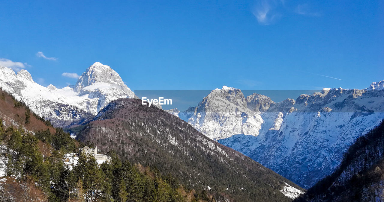 Winter landscape, scenic view of mountains, beauty in nature.