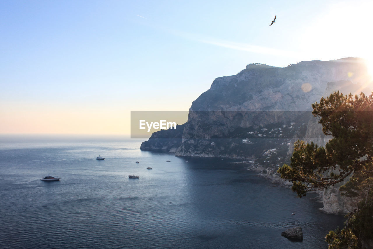 Scenic view of sea against sky at sunset