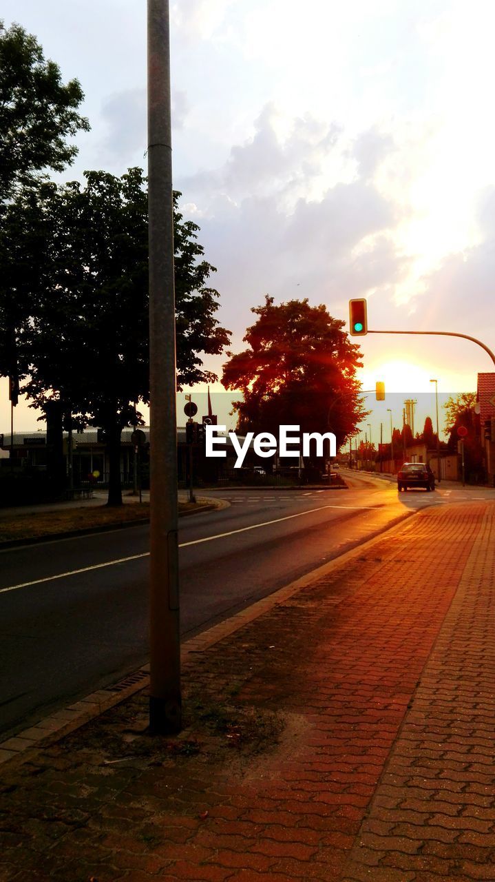 VIEW OF ROAD AT SUNSET